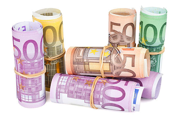 istock Rolled up Euro banknotes on white background 133889585