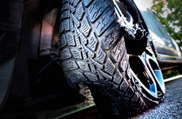 istock Damaged tire after tire explosion at high speed on the highway 1338897218
