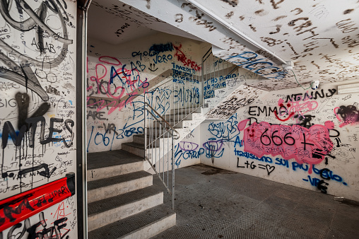 Photo of the community center building that has graffiti painted on it.