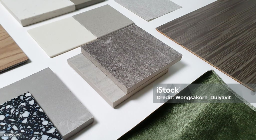 samples of interior material consists concrete tile, wooden laminated or veneer, artificial stones, green fabric for drapery, wooden vinyl flooring. interior selected material for mood and tone board. Color Swatch Stock Photo