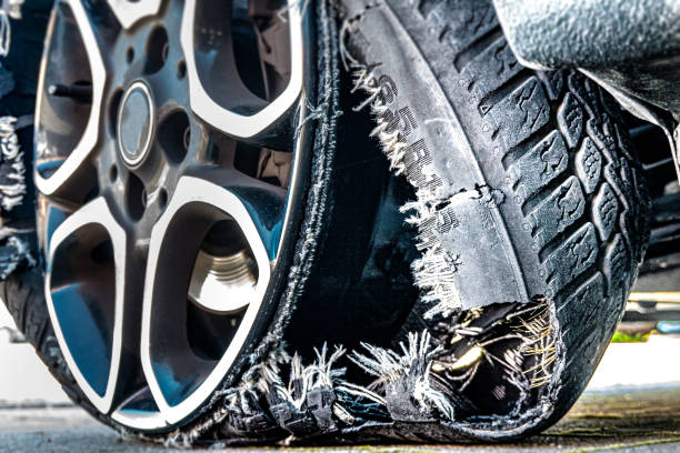 istock Damaged tire after tire explosion at high speed on the highway 1338902834