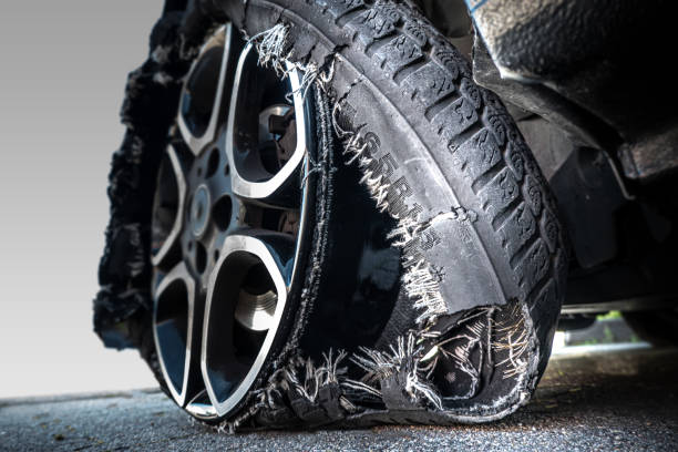 Damaged tire after tire explosion at high speed on the highway