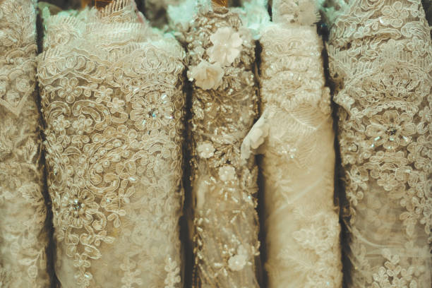 istock colorful lace fabric rolls in textile shop 1338905552