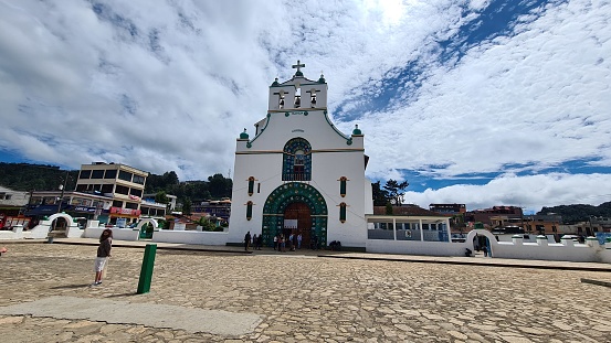 Chamula, Mexico – July 20, 2021: Façade of the Church of San Juan Chamula with its traditional patterns.