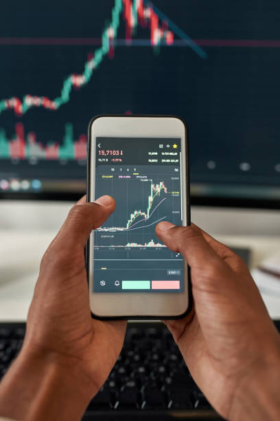 Close up man trade online on gadgets