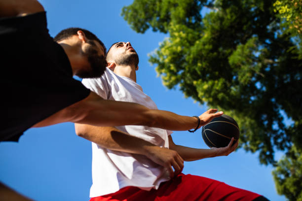 istock 1 on1 street basketball 1338913174