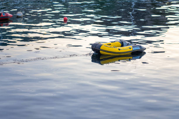 istock Yellow Inflatable dinghy in harbour 1338915905
