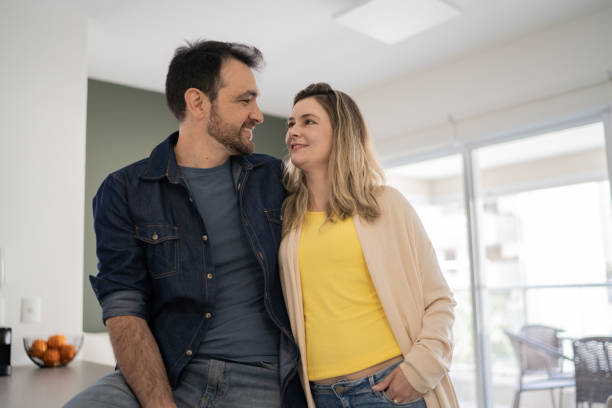 istock Happy couple together at home 1338918425