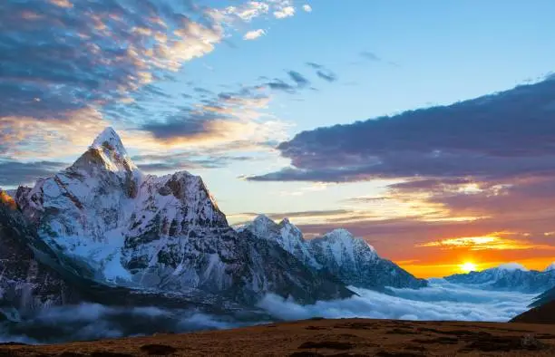 Evening sunset view of mount Ama Dablam on the way to Everest Base Camp, Nepal Himalayas mountains