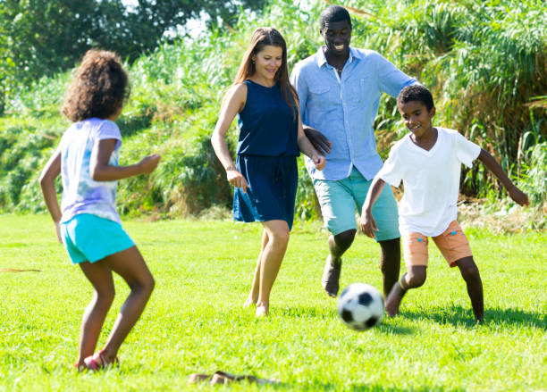 istock Family playing ball 1338919649