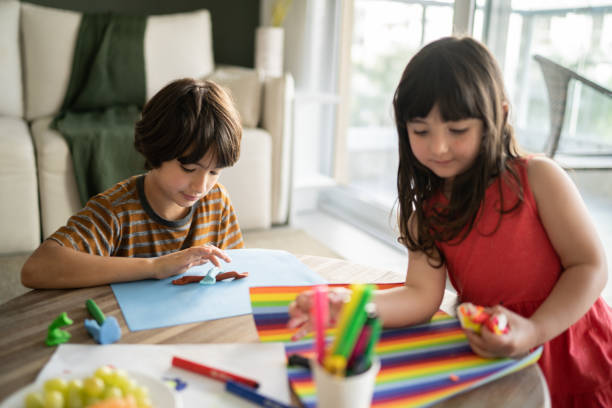 istock Kids drawing at home 1338922435