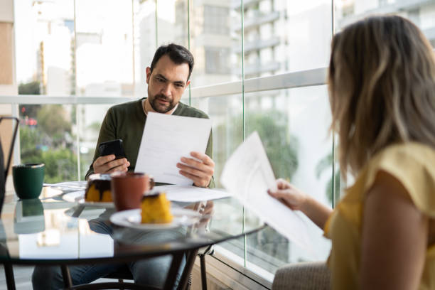 istock Couple doing home finances during breakfast at home 1338923885