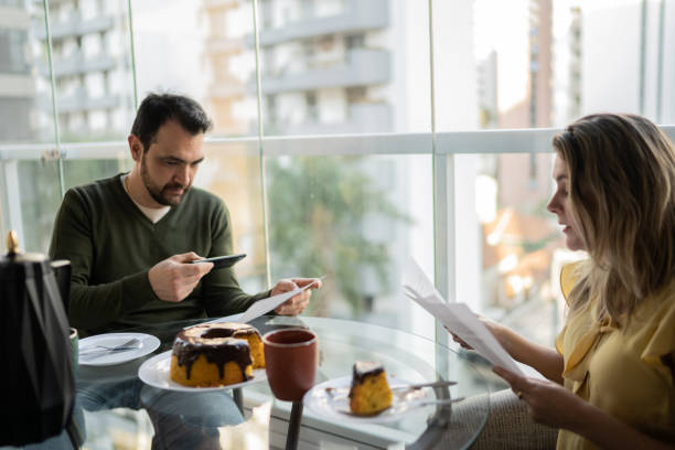 istock Couple doing home finances during breakfast at home 1338923898