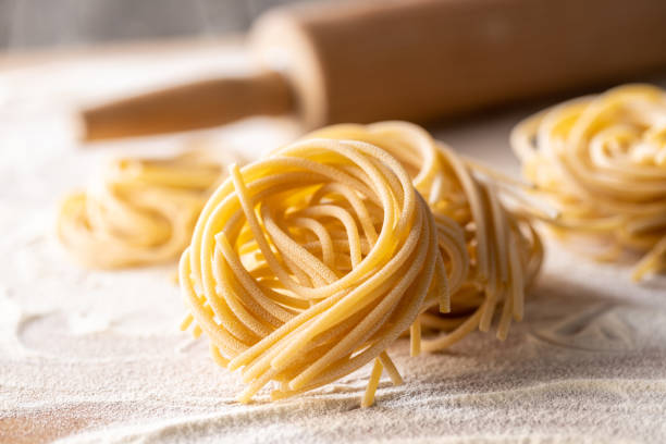 istock Italian pasta nest. Uncooked spaghetti nest. 1338923953