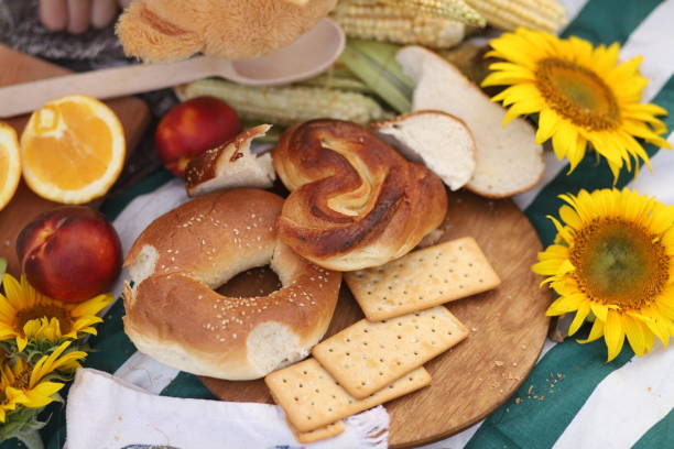 istock Summer picnic fruit and bread on a blanket in the 1338926179