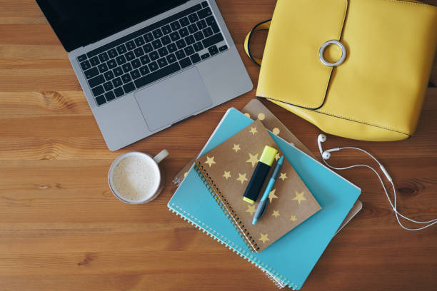 istock Laptop and school supplies on the table 1338926573