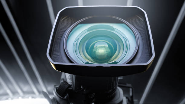 istock Camera lens for broadcast protected against incident sunlight during live transmission 1338927557