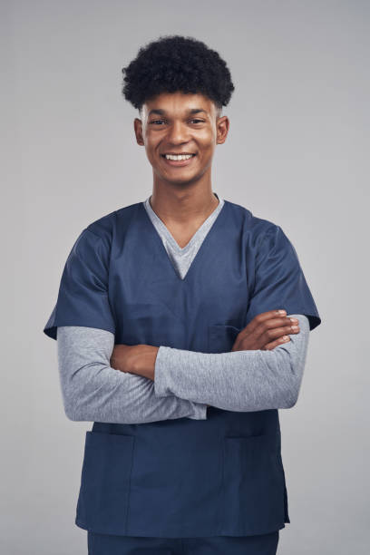 istock Shot of a medical practitioner standing against a grey background 1338927707