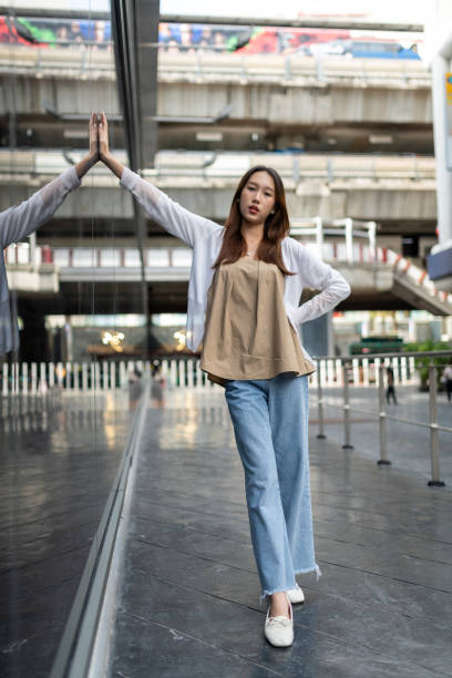 istock Young asian lady on the street 1338929205