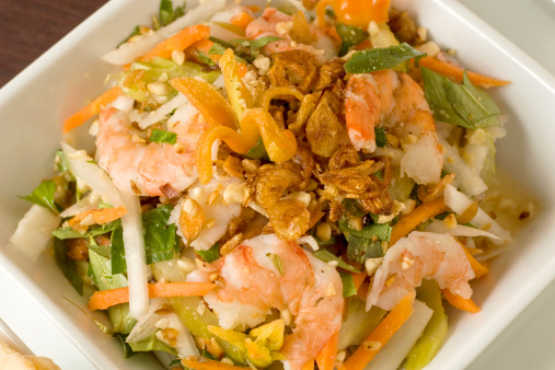 Shrimp salad appetizer in white bowl