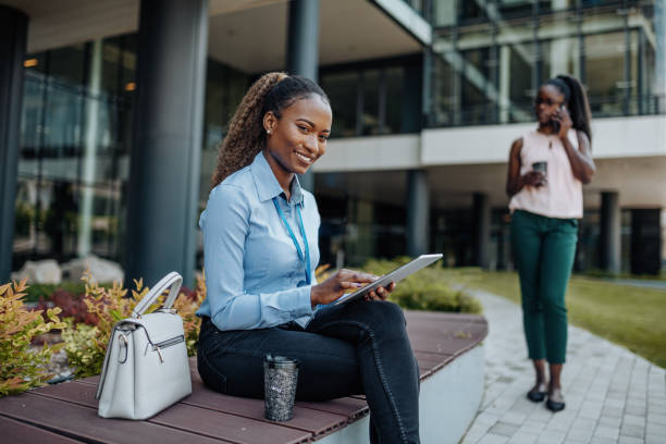 istock African American business people in financial district, using digital tablet and share information 1338930802