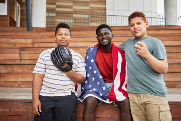 istock Coach Of Junior Baseball Team 1338935568