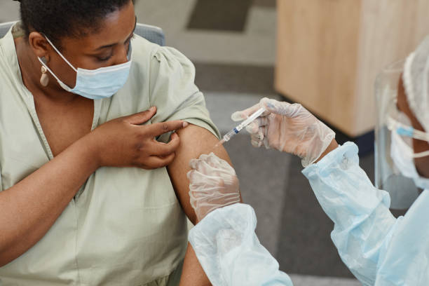 istock Injecting Vaccine against Coronavirus 1338936609