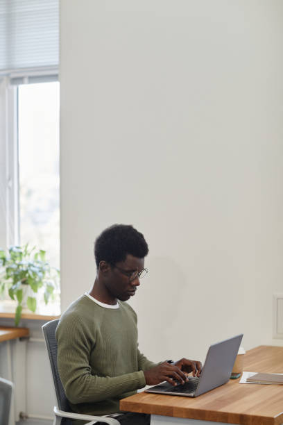 istock Frowning Businessman Working on Laptop 1338936667