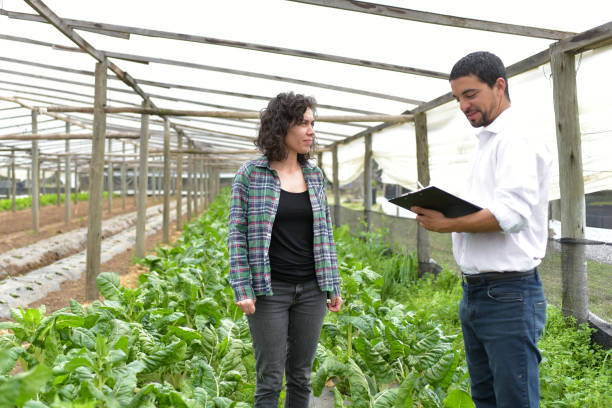 istock woman farmer with seller 1338939572