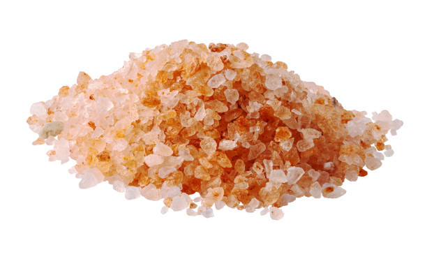 istock Pile of Himalayan pink salt isolated on white 1338940485