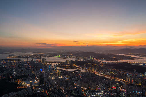 Aerial view of city lights at sunset, Xiamen, China