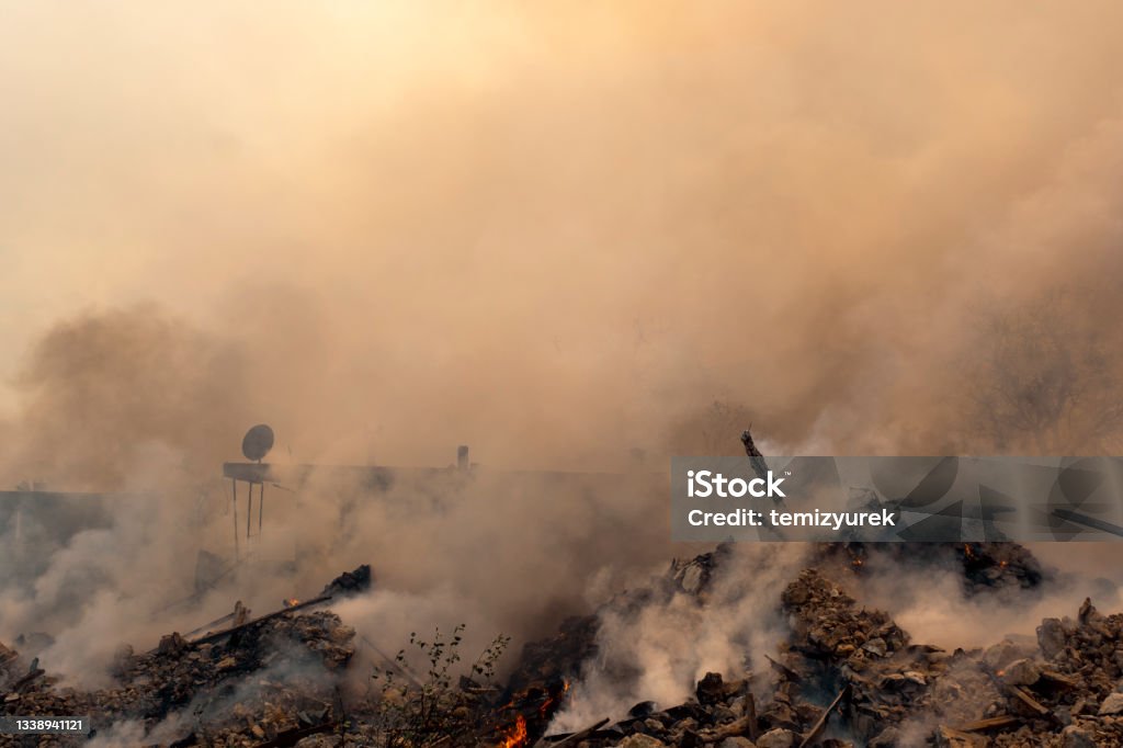 Burning demolished house A Burning demolished house in Manavgat Fire, Antalya, Turkey. Climate Crisis Stock Photo
