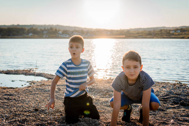 istock Two boys by the Lake 1338941201