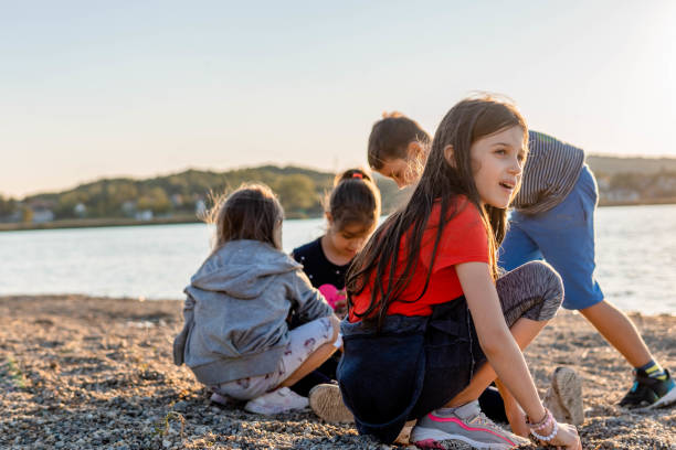 istock Children playing on the beach near Lake 1338941235