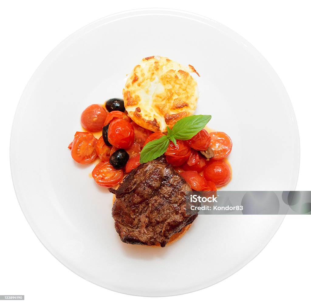 Deliciosos bistecs Aislado en blanco - Foto de stock de Bistec libre de derechos