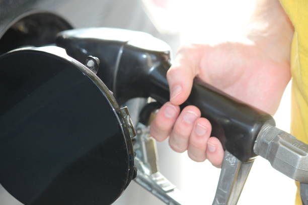 istock Pumping Gas at Fuel Pump 1338951619