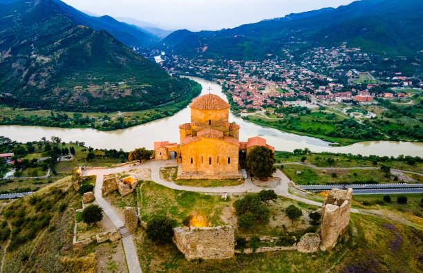 istock Aerial view of Jvari clifftop orthodox monastery located in Mtskheta Georgia at night illuminated 1338956502