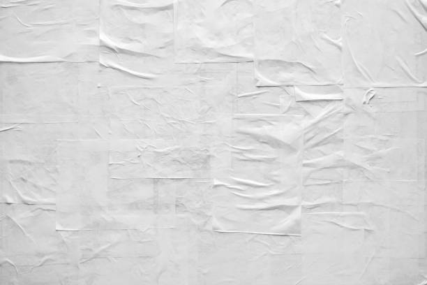 istock Blank white crumpled and creased paper poster texture 1338957568