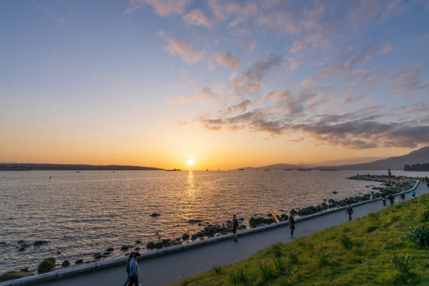 Vancouver, BC, Canada - March 30 2021 : Sunset Beach Park beautiful landscape in spring sunset time.