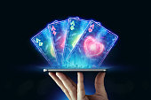 kreativer-hintergrund-online-casino-in-der-hand-eines-mannes-ein-smartphone-mit-spielkarten.jpg?b=1&s=170x170&k=20&c=qsnCvIO_qib6H8jFmJ07FaQWRIVyKcNaWfmI2nAr9oE=