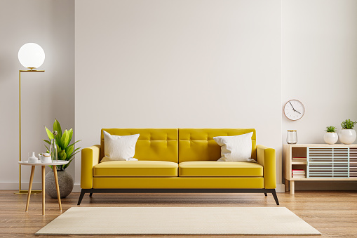 Yellow sofa and wooden table in living room interior with plant,white wall.3d rendering
