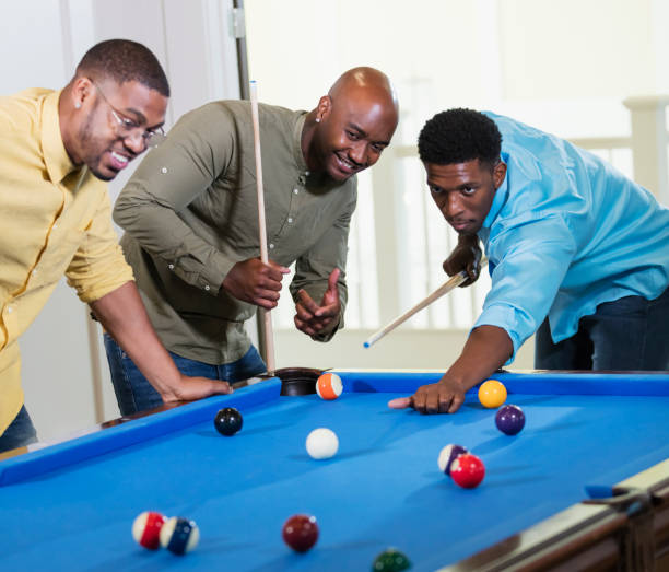 istock Three African-American men shooting pool 1338970308