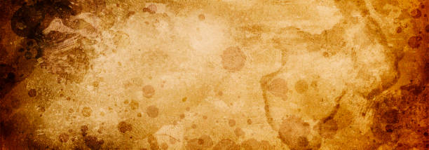 istock Vintage grunge old paper texture in spots as background 1338970626