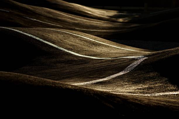 istock Sunset view of bike park rollers. 1338973233