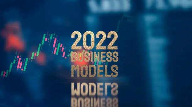 Photo of gold word 2022 business models and chart for business concept 3d rendering