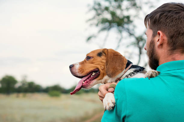 istock Portrait owner man with dog 1338975269