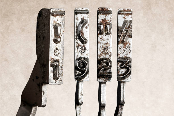 istock vintage old typewriter hammers with the date 1923  isolated 1338976381