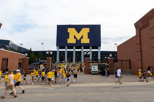 Ann Arbor, MI - September 4, 2021: Unidentified Fans exit Michigan Stadium after a University of Michigan football game