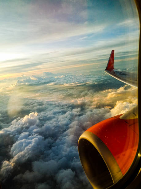 istock View of clouds at high altitude in an airplan 1338985352
