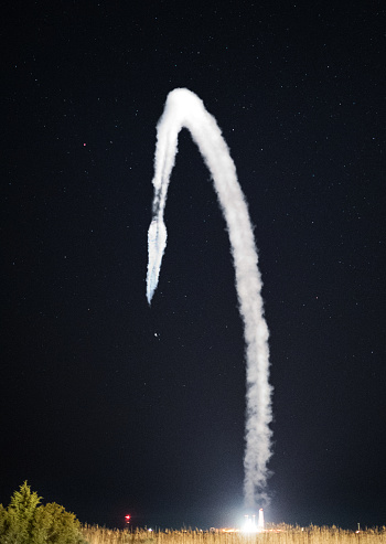 Missile launch trail in the night sky. Elements of this image furnished by NASA. 

/nasa urls:
https://www.nasa.gov/centers/dryden/Features/sonic_bobs_tests.html
(https://www.nasa.gov/sites/default/files/images/361373main_ED09-0148-02_full.jpg)
https://images.nasa.gov/details-NHQ201811170002.html